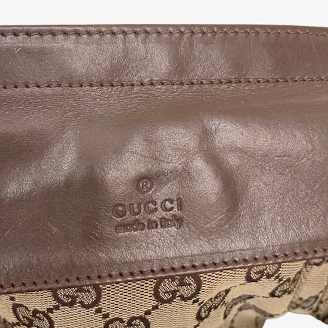 Gucci monogram double pocket waist belt bag.