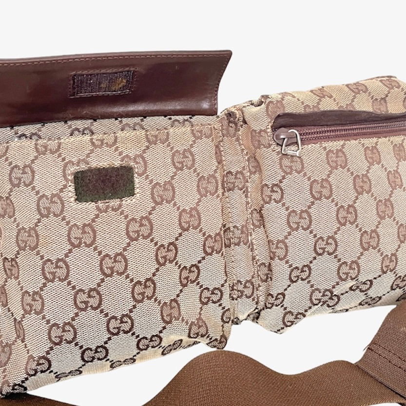 Gucci monogram double pocket waist belt bag.